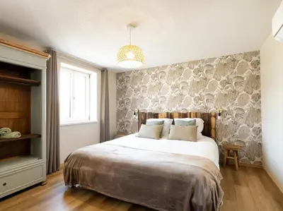 Un ou plusieurs lits dans un hébergement de l'établissement Les loges de Marianne, gites d'exception proche Europapark