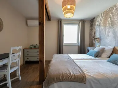 Un ou plusieurs lits dans un hébergement de l'établissement Les loges de Marianne, gites d'exception proche Europapark