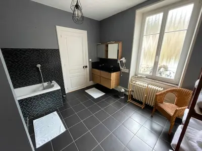 Salle de bains dans l'établissement Chambre suite Arnica