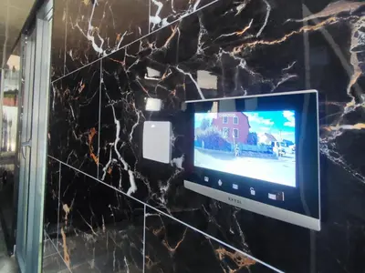 Télévision ou salle de divertissement dans l'établissement R luxury piscine et spa privatifs