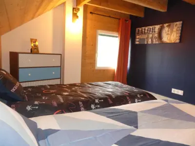 Un ou plusieurs lits dans un hébergement de l'établissement LE MASSIF - Appartement au sommet avec vue panoramique