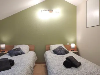 Un ou plusieurs lits dans un hébergement de l'établissement Cocon de la belle de Vosges 3 chambres