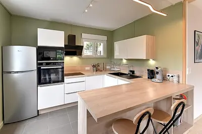 Cuisine ou kitchenette dans l'établissement Le Cocoon Clairefontaine - Maison vue montagne