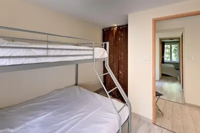 Un ou plusieurs lits dans un hébergement de l'établissement Le Kichompré - Appt 50 m² vue montagne