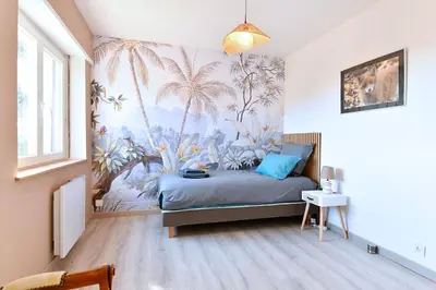 Coin salon dans l'établissement Gîte les Rosiers du Blosen