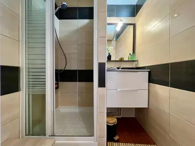 Salle de bains dans l'établissement Le Petit Moulin