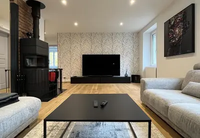 Télévision ou salle de divertissement dans l'établissement Le Domaine Endila