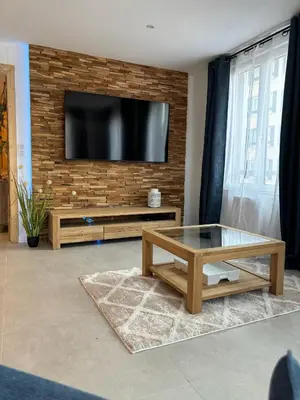 Télévision ou salle de divertissement dans l'établissement Gîte Eden classer 3 étoiles