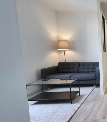 Coin salon dans l'établissement Appartement lumineux 2 chambres