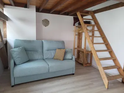 Coin salon dans l'établissement L'Essentiel-Appartement neuf et cosy avec piscine
