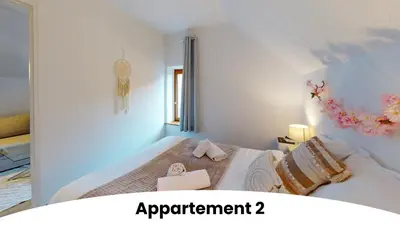 Un ou plusieurs lits dans un hébergement de l'établissement Les appartements au pied du Haut Koenigsbourg
