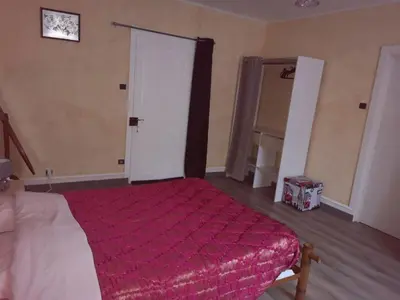 Un ou plusieurs lits dans un hébergement de l'établissement Logement 100 m2 3 chambres 2 salles de bains