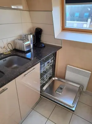 Cuisine ou kitchenette dans l'établissement Le Maraîcher avec terrasse, wifi, parking gratuit