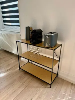 Cuisine ou kitchenette dans l'établissement Charmant Appartement Mulhouse