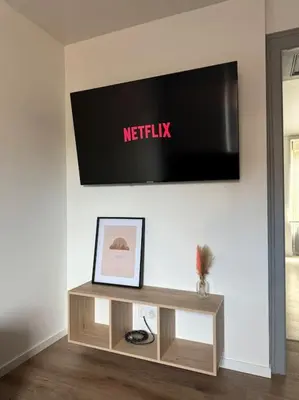 Télévision ou salle de divertissement dans l'établissement Appartement la citadelle