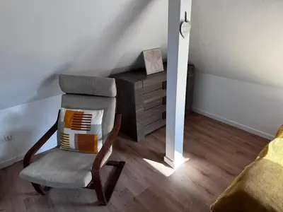 Coin salon dans l'établissement Au pieds du vignoble Colmarien