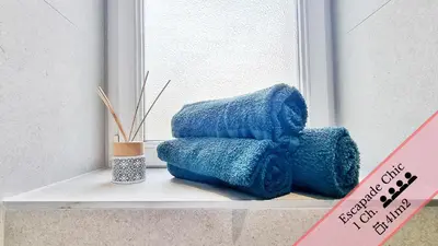 Coin salon dans l'établissement Les Suites Mulhousiennes - Charme & Sérénité