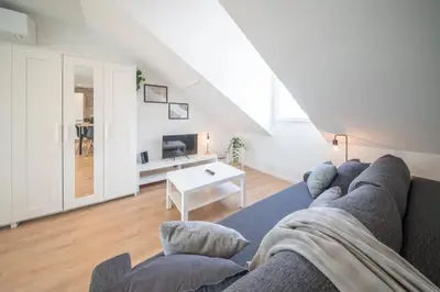 Coin salon dans l'établissement Superbe appartement climatisé parking free