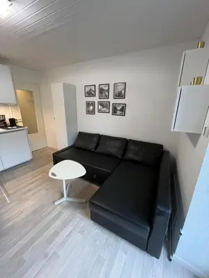 Coin salon dans l'établissement Appartment 4 personnes La Bresse