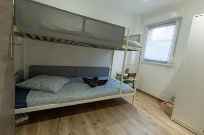Un ou plusieurs lits dans un hébergement de l'établissement Appartement cosy et lumineux à Kaysersberg