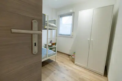 Un ou plusieurs lits dans un hébergement de l'établissement Appartement cosy et lumineux à Kaysersberg