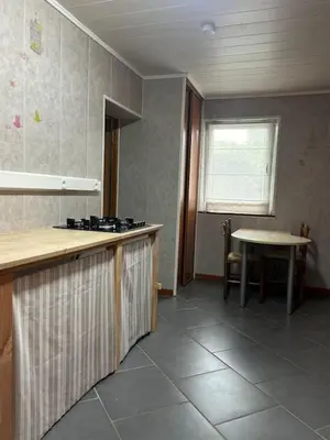 Cuisine ou kitchenette dans l'établissement Gite La Miellerie