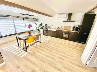 Cuisine ou kitchenette dans l'établissement L appartement du Fayé