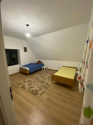 Un ou plusieurs lits dans un hébergement de l'établissement Appartement tranquille