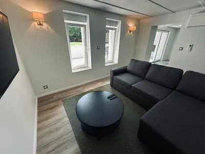 Coin salon dans l'établissement Le Parc 96 - Gîte aux Portes de Colmar