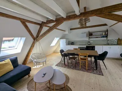 Cuisine ou kitchenette dans l'établissement Le grenier du Rempart, appartement au coeur du village