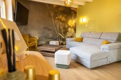 Coin salon dans l'établissement LES GRANGES DE JADIS ALSACE Bis