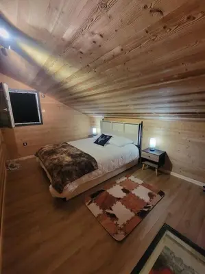 Un ou plusieurs lits dans un hébergement de l'établissement Chalet à louer, Spa, sauna, billard, gerardmer