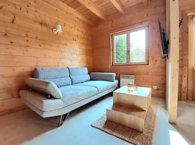 Coin salon dans l'établissement Domaine la Clairière et Bain nordique