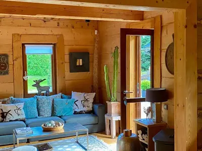 Coin salon dans l'établissement Datchas Lodges