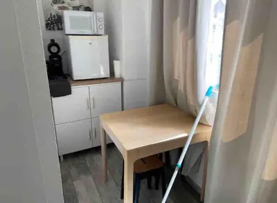 Cuisine ou kitchenette dans l'établissement Appart Melvyn Chanael - proche gare