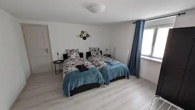 Un ou plusieurs lits dans un hébergement de l'établissement Maison 110m2, 7 Lits, Pro & Famille