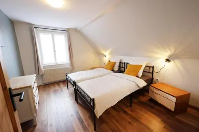 Un ou plusieurs lits dans un hébergement de l'établissement Gîte Le Ruisseau