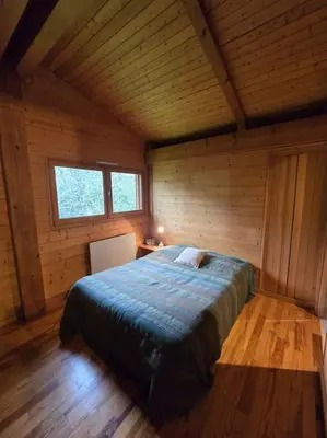 Un ou plusieurs lits dans un hébergement de l'établissement Chalet Familial Cosy et moderne