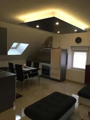 Cuisine ou kitchenette dans l'établissement La maison pailletée Giromagny