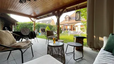 Coin salon dans l'établissement HAVRE DE PAIX - Maison 3 étoiles - Piscine Privée - Europapark