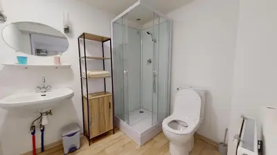 Salle de bains dans l'établissement Le Bois Dormant 2