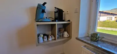 Cuisine ou kitchenette dans l'établissement La Maison des Montagnes
