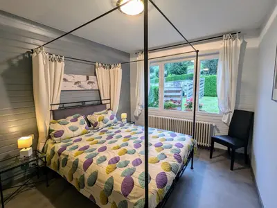 Un ou plusieurs lits dans un hébergement de l'établissement Gîte à Gérardmer : sauna, terrasse, proche lac et stations de ski - FR-1-589-669