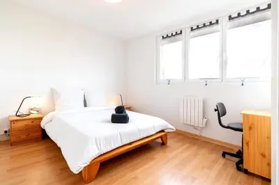 Un ou plusieurs lits dans un hébergement de l'établissement Appartement 3 chambre 74m2