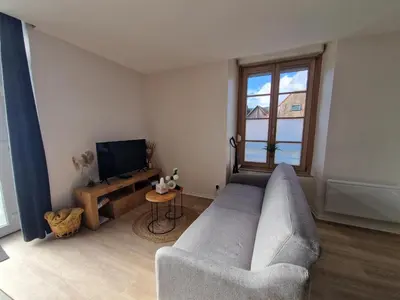 Télévision ou salle de divertissement dans l'établissement La bulle Mathias