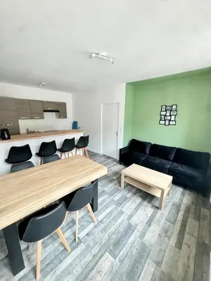 Coin salon dans l'établissement Cosy 2 - Montbéliard centre 80m2