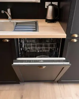 Cuisine ou kitchenette dans l'établissement Villa La Perle Bleue