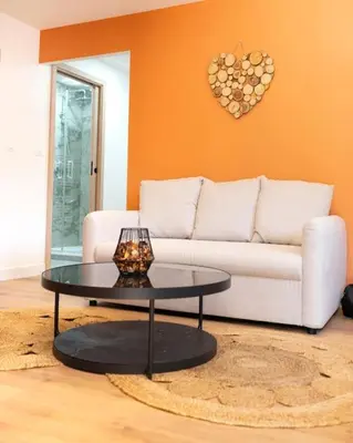 Coin salon dans l'établissement Villa La Perle Bleue