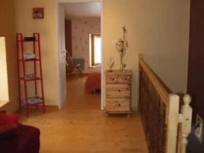 Un ou plusieurs lits dans un hébergement de l'établissement Gîte confortable près de Gérardmer avec terrasse et accueil chaleureux - FR-1-589-676