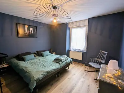 Un ou plusieurs lits dans un hébergement de l'établissement Appartement rénové avec jardin, parking et WiFi à Gérardmer - FR-1-589-678